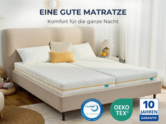 Weiße Matratze mit gelber Naht auf beigem Bett, CertiPUR & OEKO-TEX zertifiziert, 10 Jahre Garantie